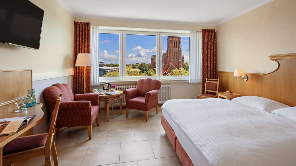 Comfort Double Room, Non Smoking | In-room safe, desk, laptop workspace, blackout drapes