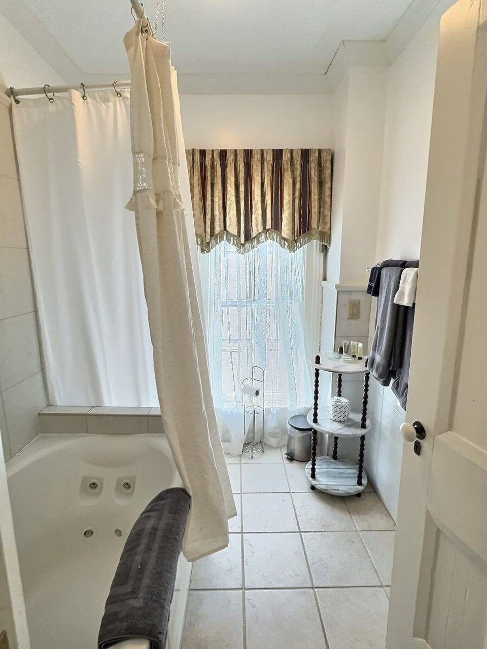 Lawton Suite | Bathroom | Hair dryer, towels, soap, shampoo