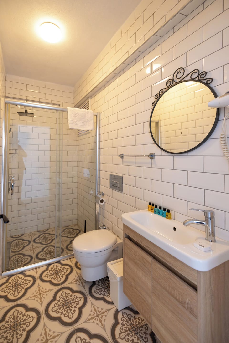 Shower, free toiletries, hair dryer, slippers