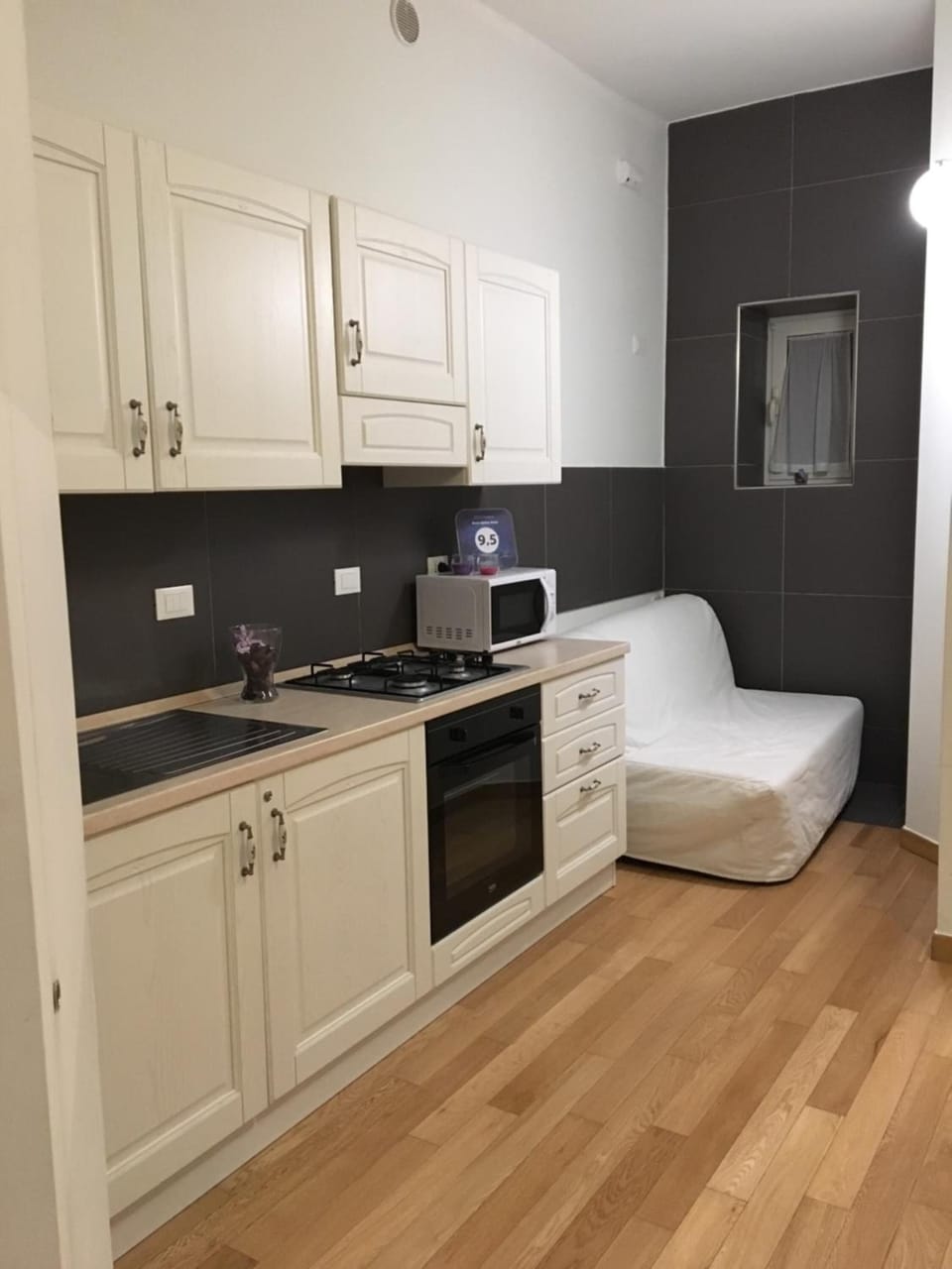 Fridge, microwave, stovetop, cookware/dishes/utensils