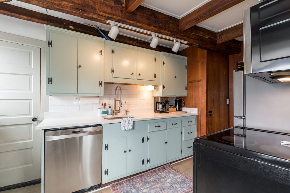 Kitchen offers Dishwasher,  Range, microwave, coffee maker(drip)