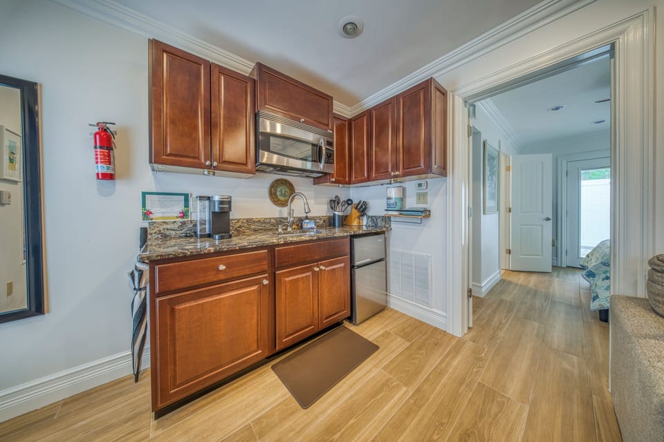 In law area: Kitchenette with mini fridge + full size fridge w/ ice maker avail.