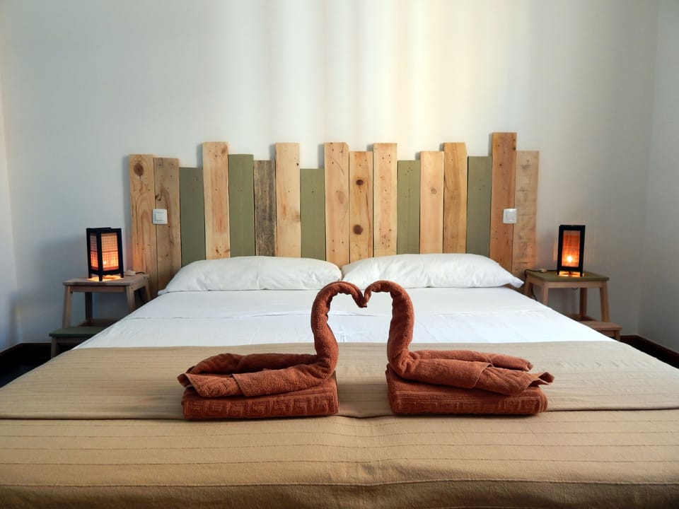 Twin Room, Shared Bathroom | Blackout drapes, free WiFi, bed sheets