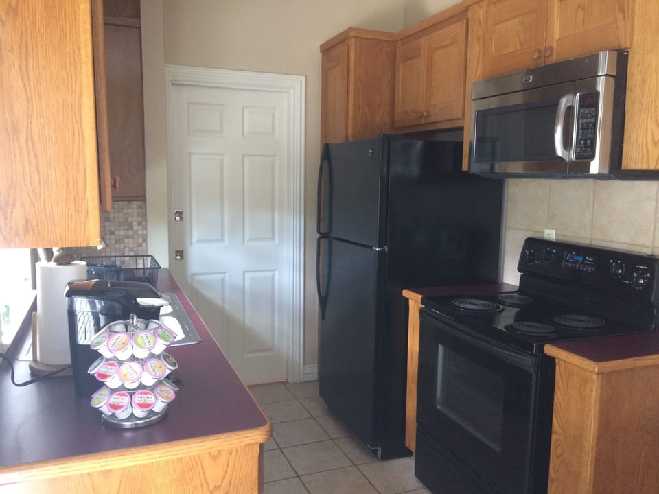 Traditional Suite, 1 Queen Bed, Non Smoking | Private kitchen | Full-size fridge, microwave, oven, stovetop