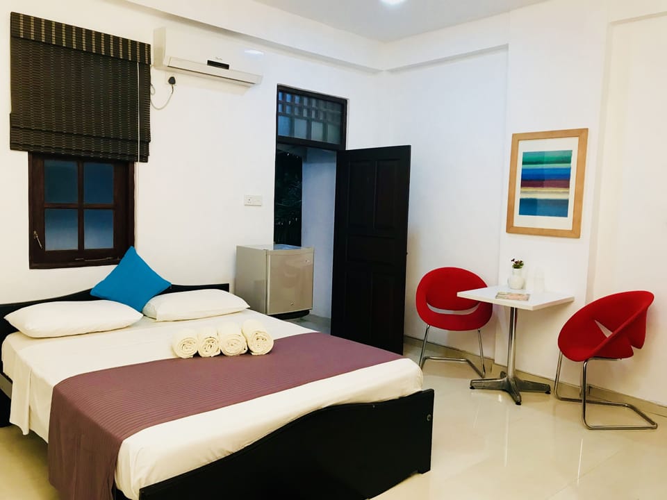 Premium bedding, down comforters, pillowtop beds, minibar