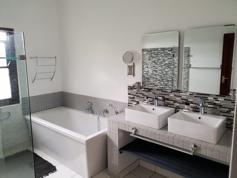 Designer toiletries, hair dryer, towels