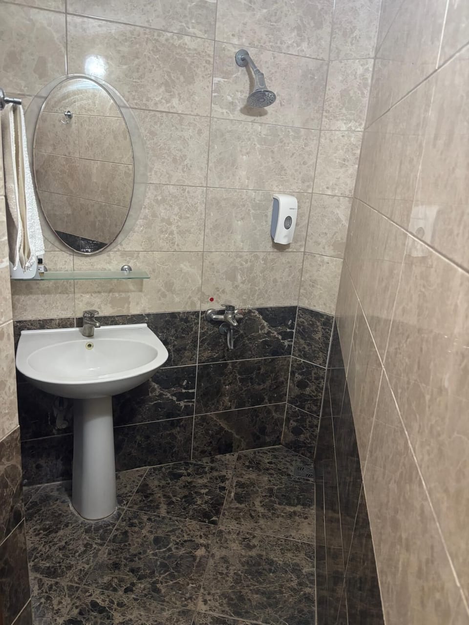 Shower, free toiletries, hair dryer, slippers