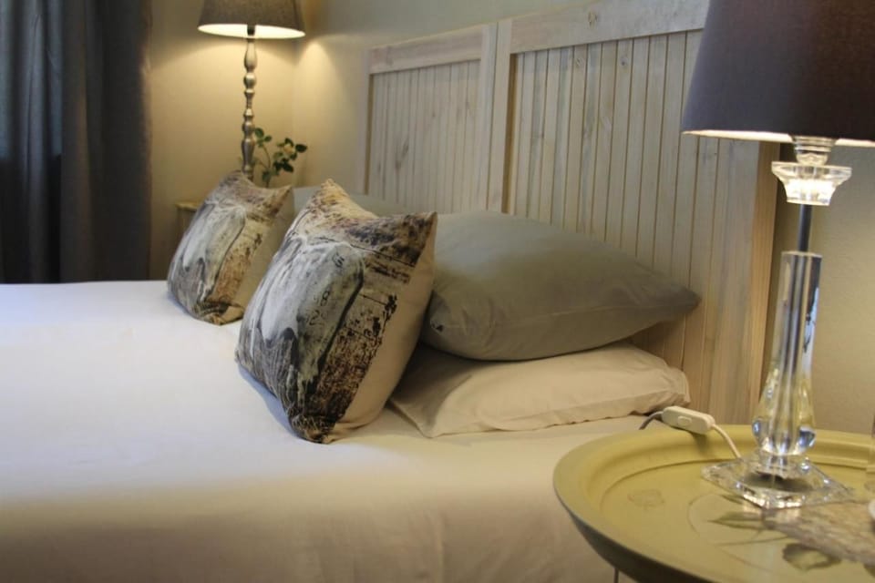 King/Twin En-Suite  | 1 bedroom, down comforters, individually decorated