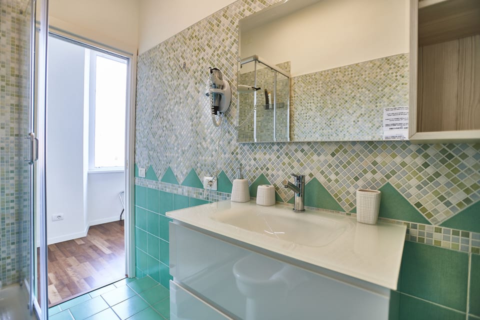 Classic Room, 1 Bedroom, Non Smoking | Bathroom | Shower, free toiletries, hair dryer, bidet