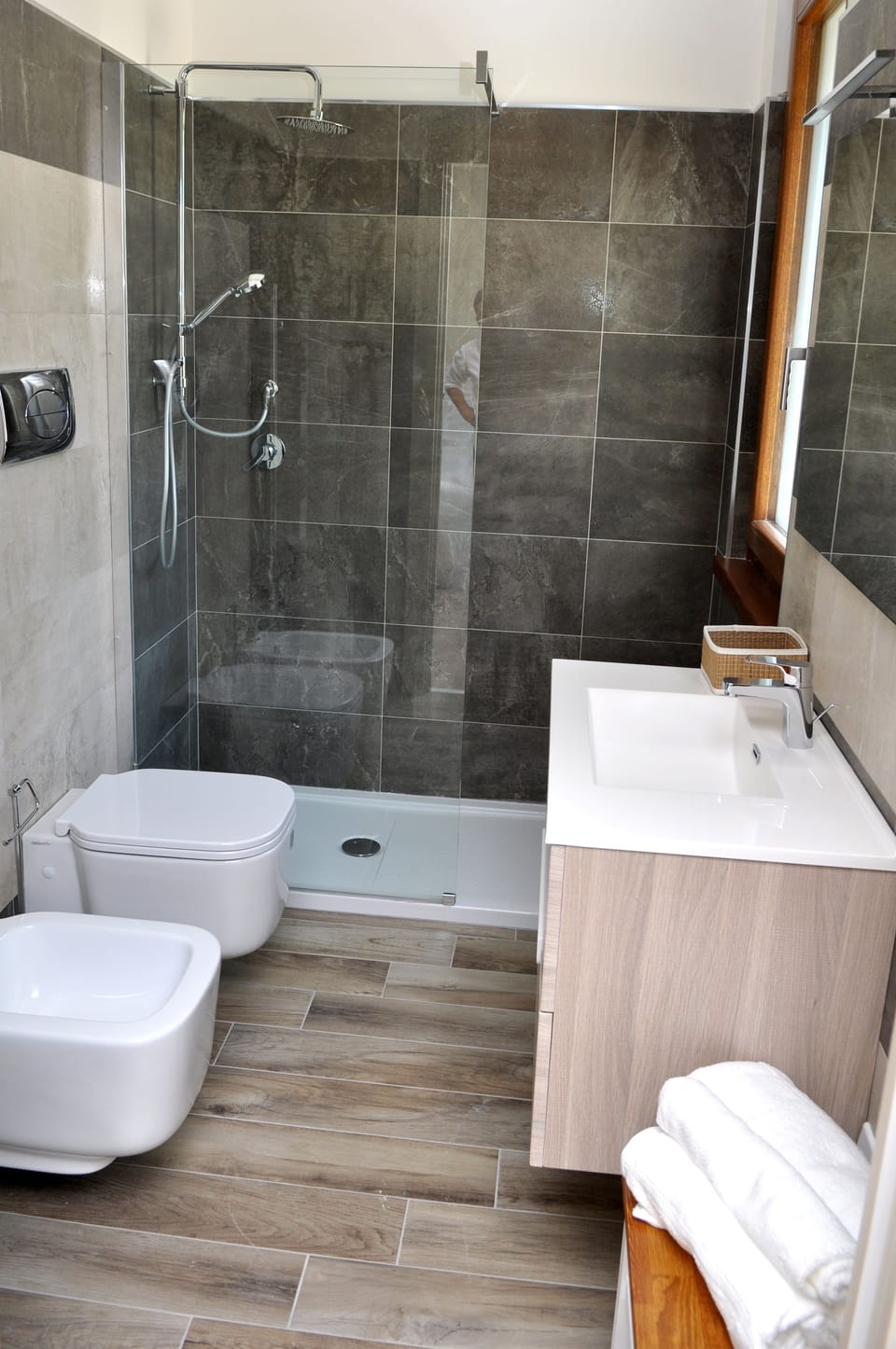 Shower, free toiletries, hair dryer, slippers
