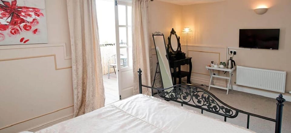 1 bedroom, blackout drapes, soundproofing, iron/ironing board