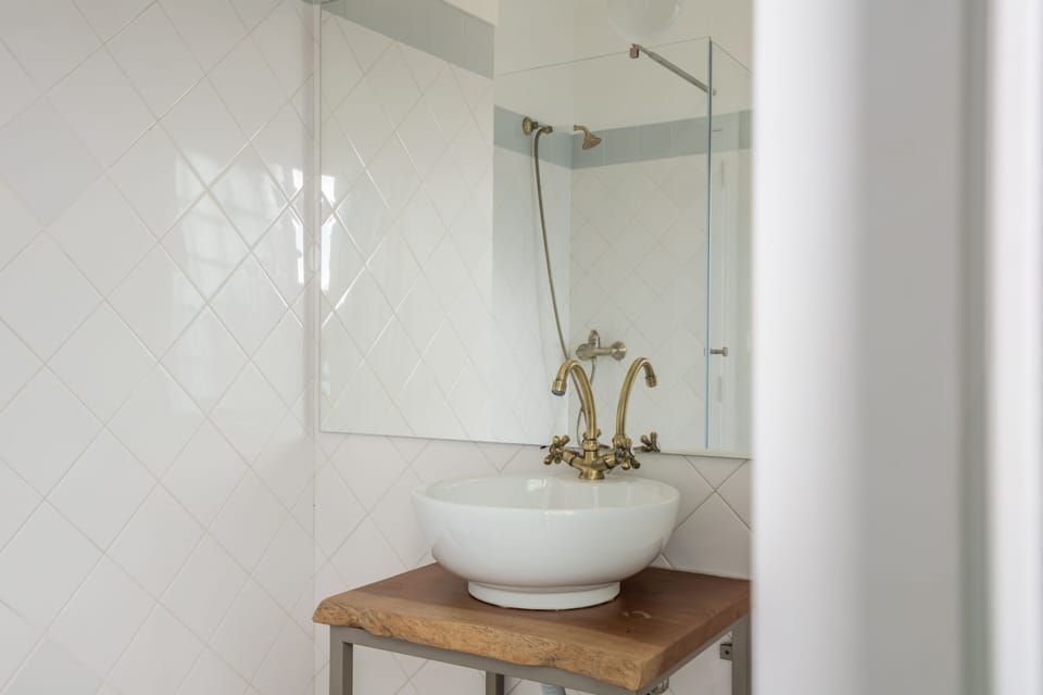 Basic Suite, Private Bathroom, City View | Bathroom | Shower, slippers, heated floors, towels