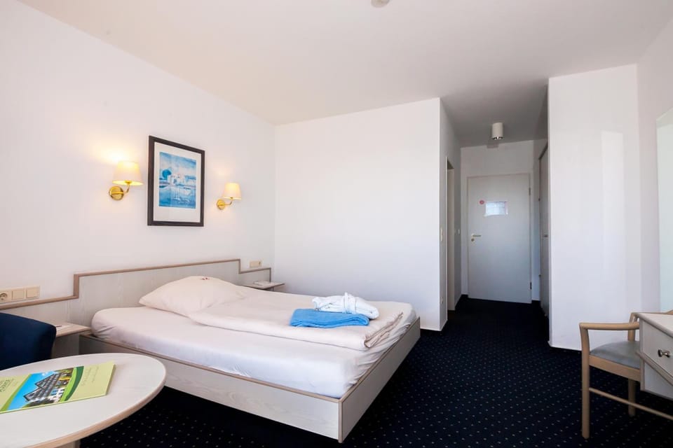 Desk, blackout drapes, soundproofing, rollaway beds