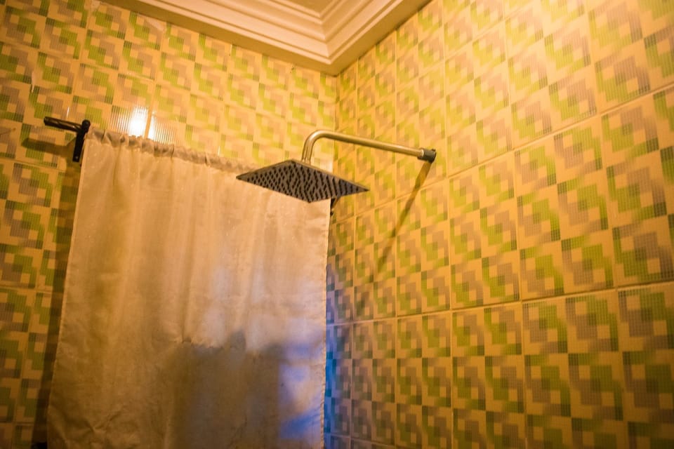 Standard Double Room, 1 Double Bed | Bathroom | Shower, rainfall showerhead, free toiletries, towels