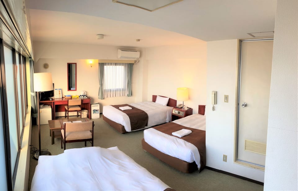 [Smoking] Triple Bed Room | Down comforters, desk, laptop workspace, blackout drapes