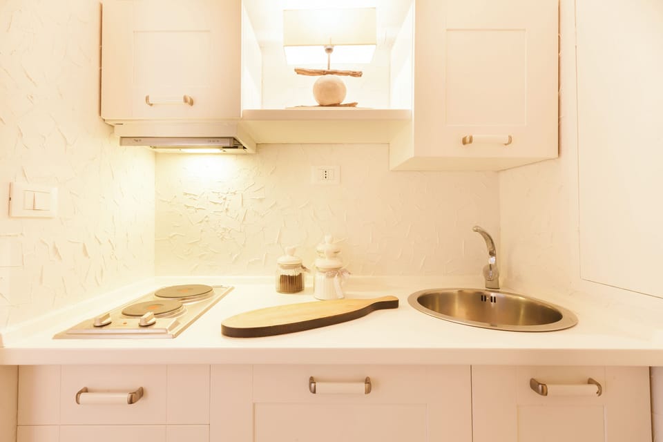 Apartment | Private kitchen | Fridge, stovetop, espresso maker, coffee/tea maker