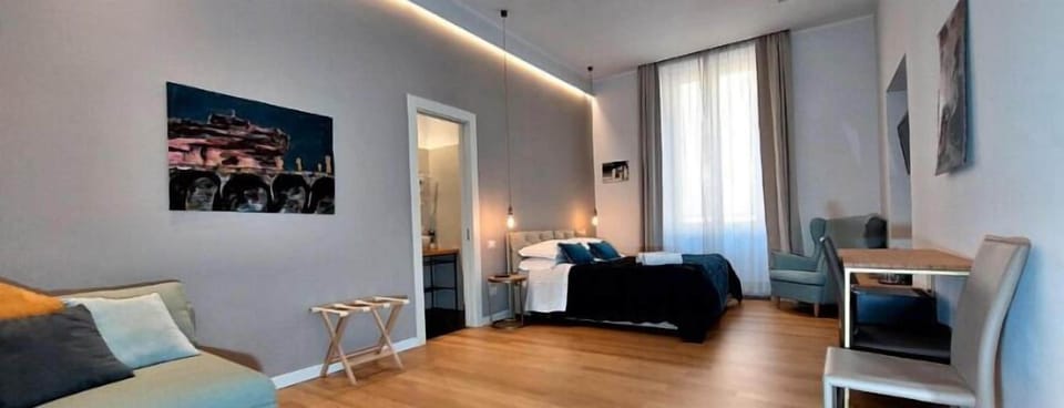 Superior Triple Room, City View | Desk, laptop workspace, soundproofing, iron/ironing board