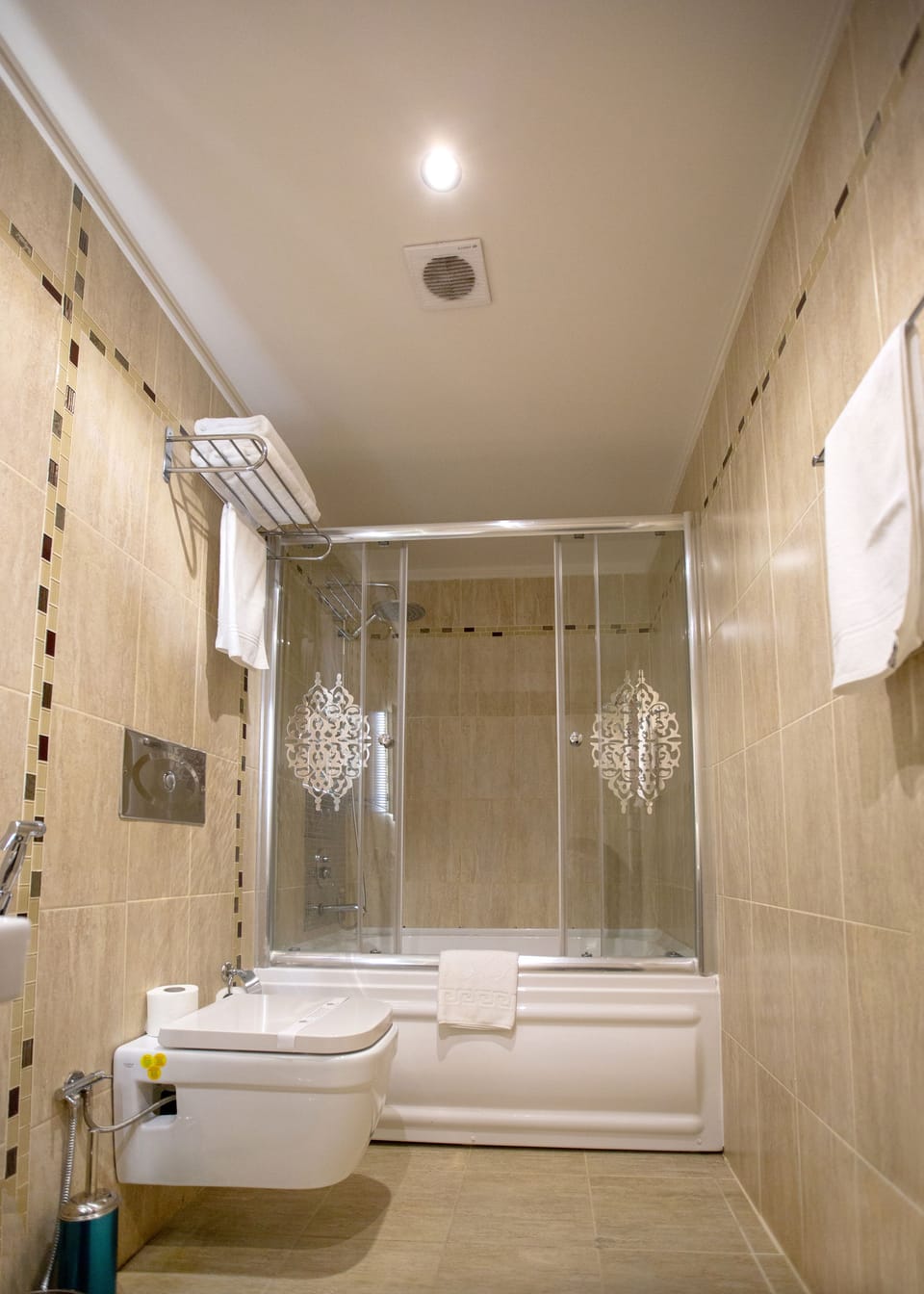 Triple Room, 3 Bedrooms | Bathroom | Shower, hair dryer, slippers, towels