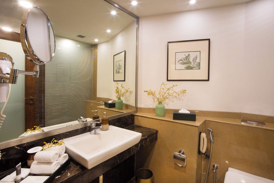 Shower, bathrobes, slippers, towels