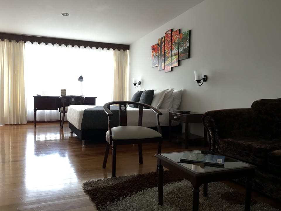 Standard Room, 1 Double Bed, Non Smoking | Living area | 32-inch plasma TV with cable channels, TV