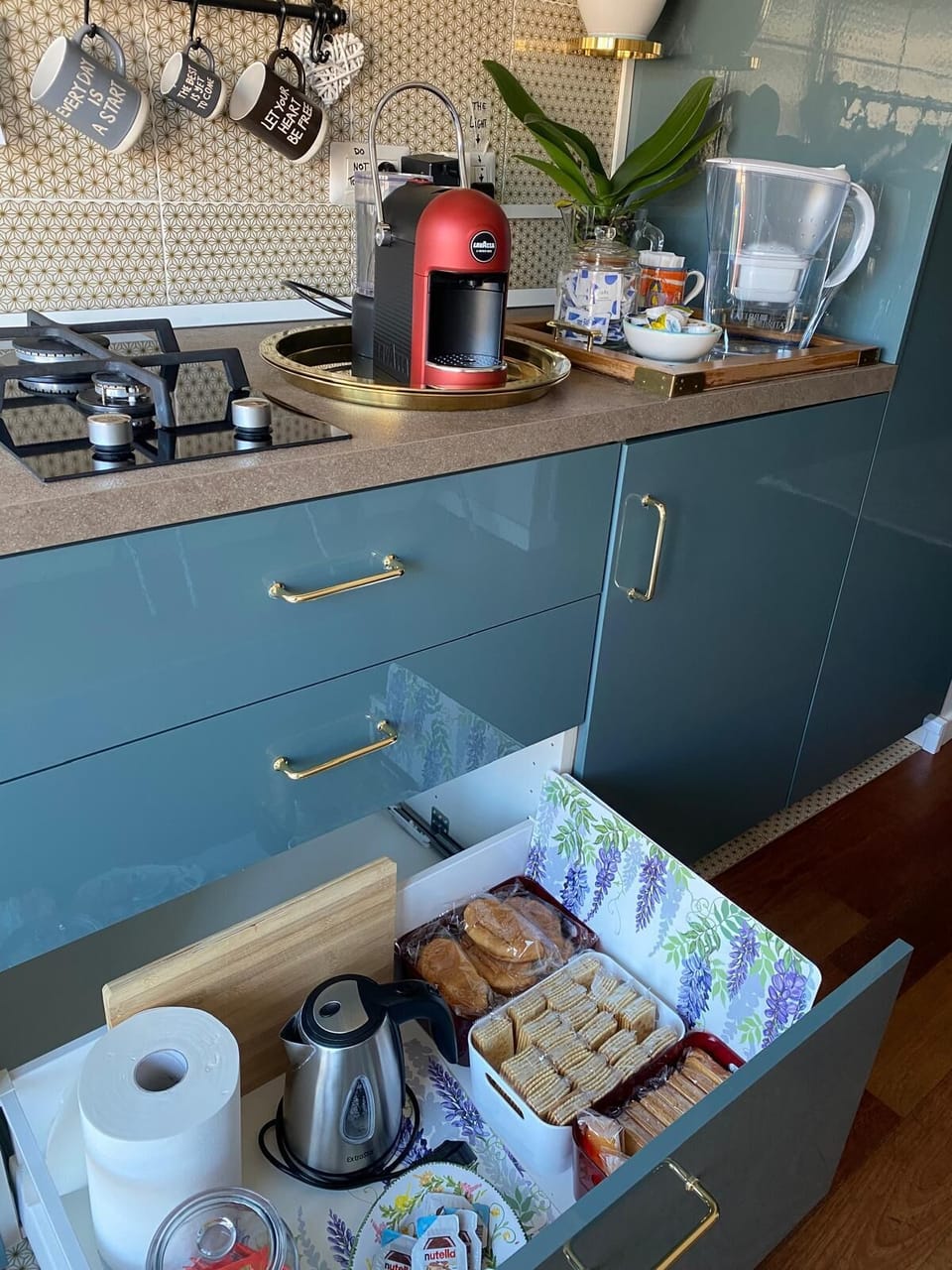 Shared fridge, espresso maker, coffee/tea maker, electric kettle
