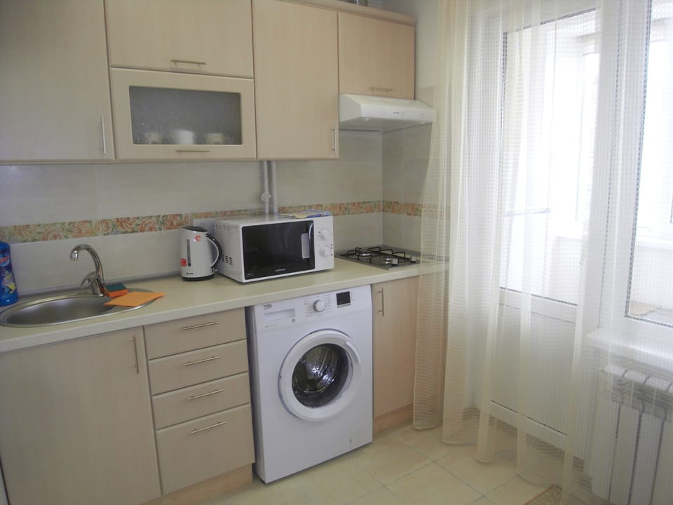 Classic Apartment, 1 King Bed with Sofa bed, Balcony | Private kitchen | Full-size fridge, microwave, stovetop, coffee/tea maker