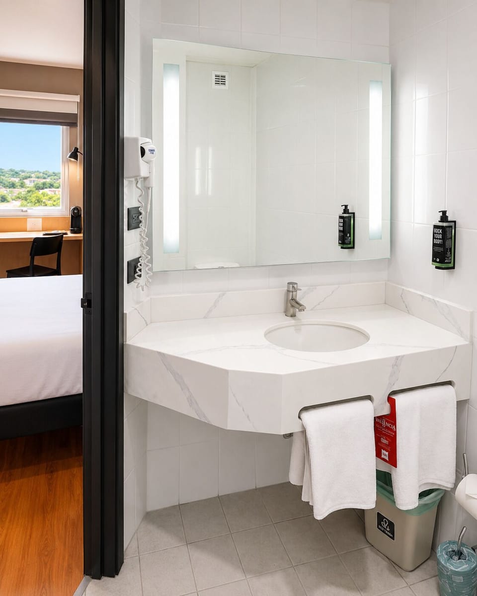 Shower, eco-friendly toiletries, hair dryer, towels