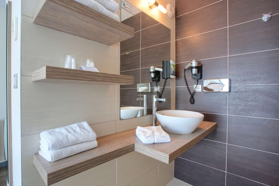 Comfort Room, 1 Queen Bed, Non Smoking (Larger Room;Twin bed on request) | Bathroom | Shower, free toiletries, hair dryer, towels