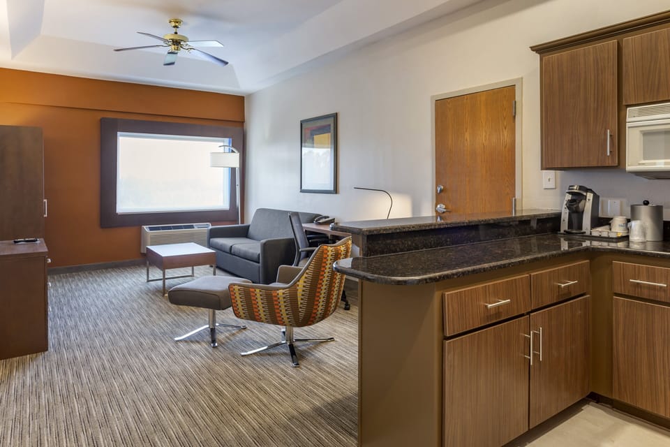 Suite, 1 Bedroom | 1 bedroom, in-room safe, blackout drapes, iron/ironing board
