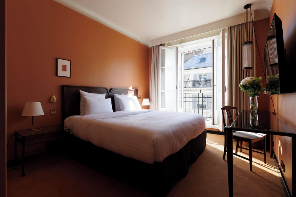 Deluxe Room | Premium bedding, memory foam beds, in-room safe, blackout drapes
