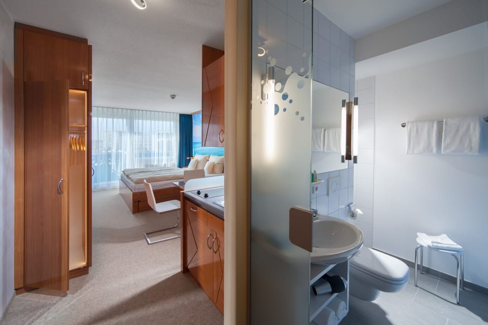 Shower, eco-friendly toiletries, hair dryer, towels