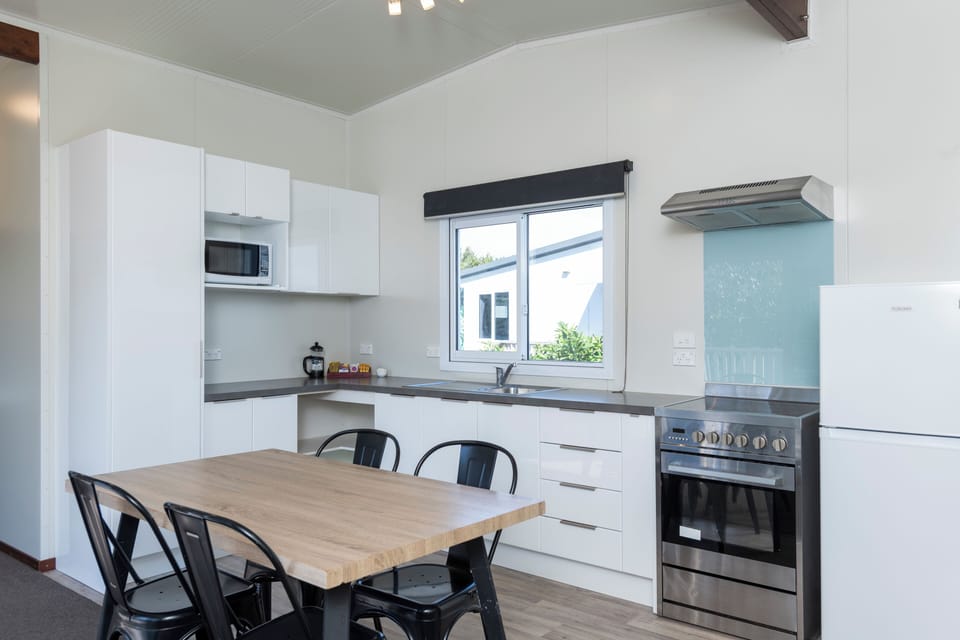 Shared fridge, microwave, toaster, cookware/dishes/utensils