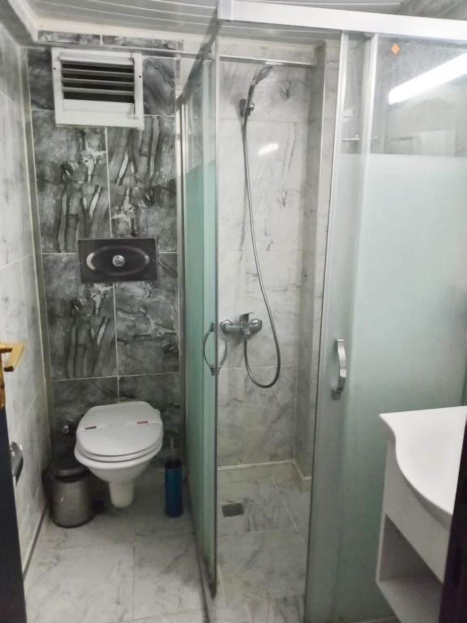 Shower, free toiletries, hair dryer, slippers