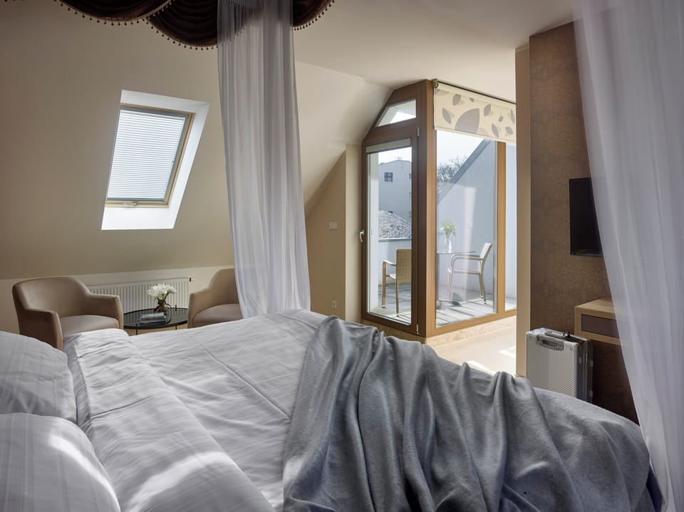 Romantic Suite, Terrace | Minibar, in-room safe, desk, laptop workspace