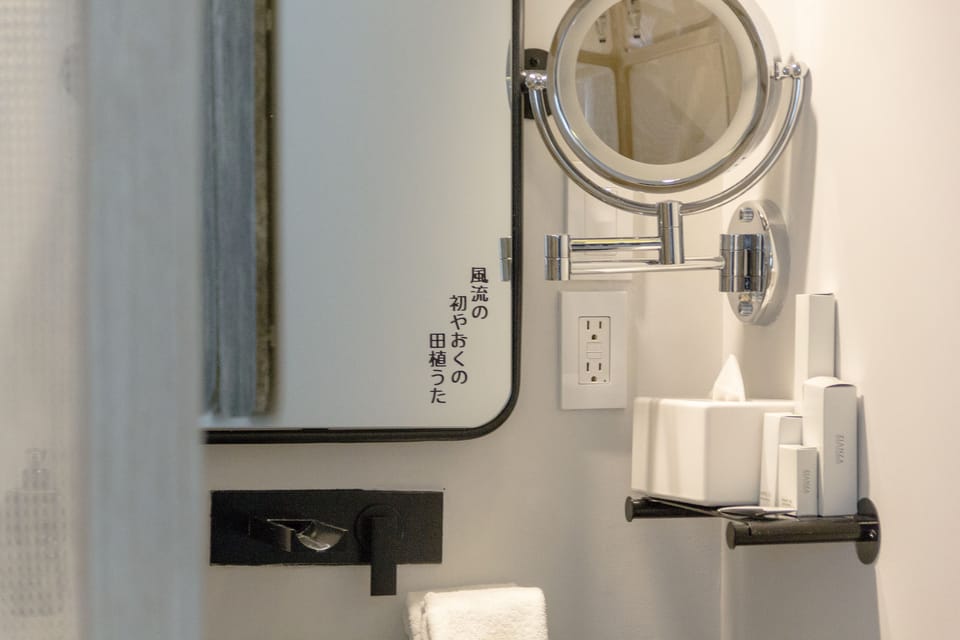 Shower, eco-friendly toiletries, hair dryer, slippers
