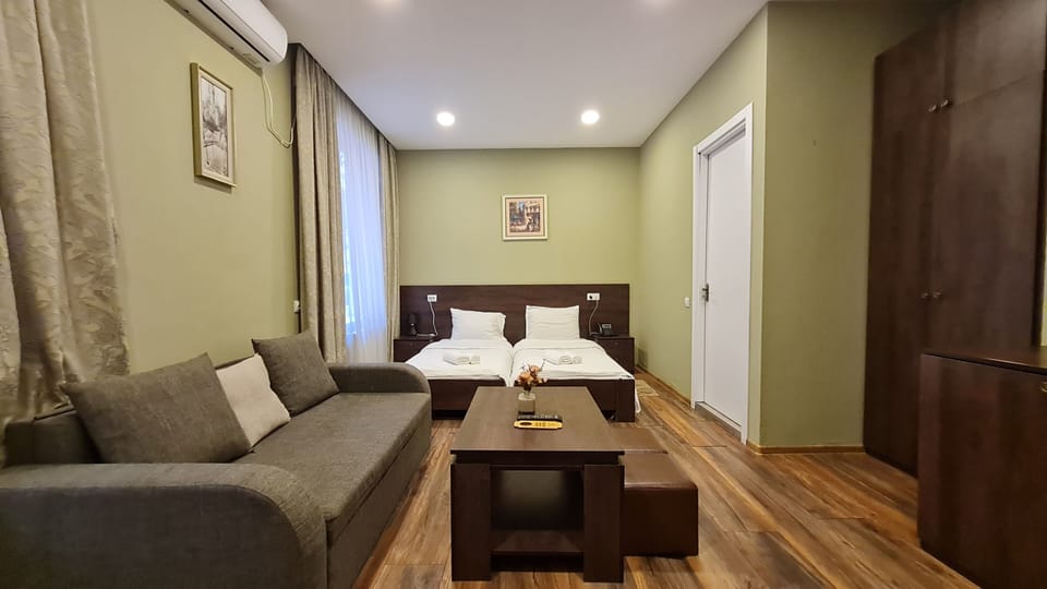 Standard Quadruple Room (202) | Premium bedding, pillowtop beds, soundproofing, iron/ironing board