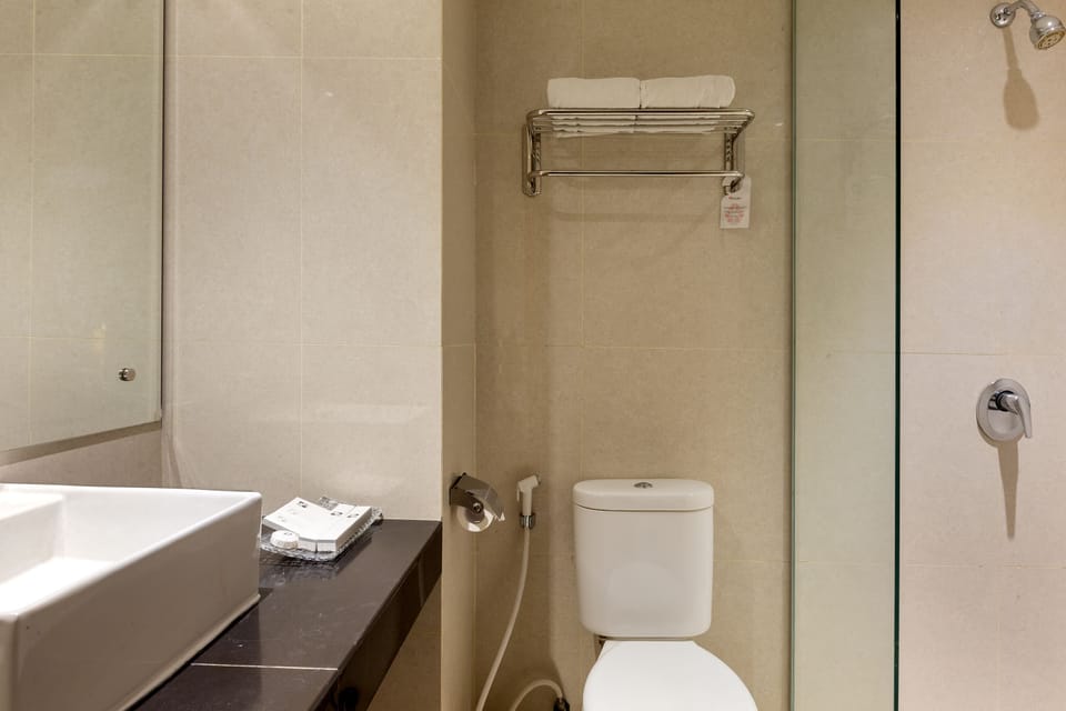 Shower, free toiletries, slippers, towels