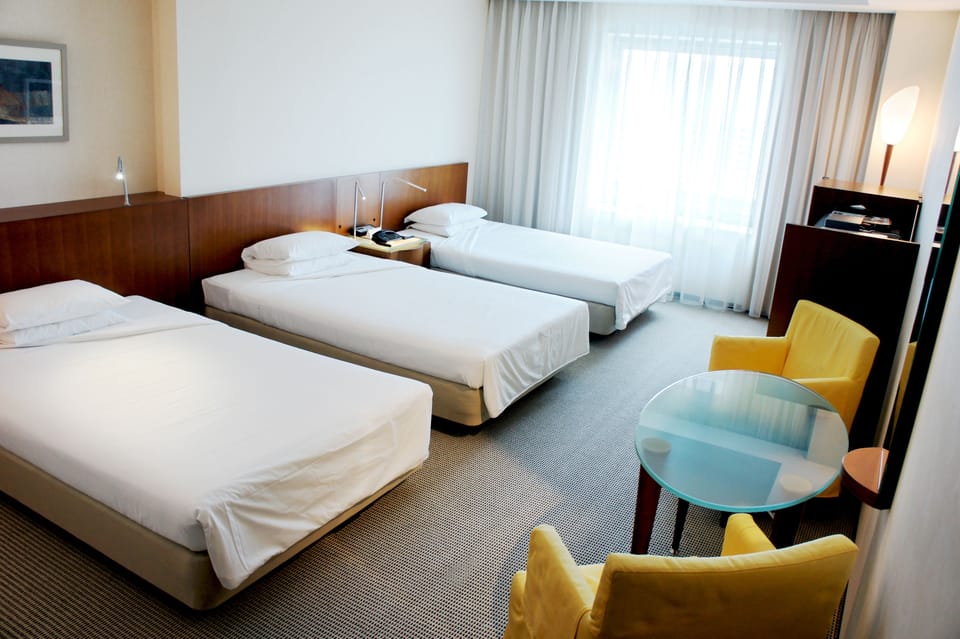 Triple Room, Non Smoking | Premium bedding, in-room safe, desk, free WiFi