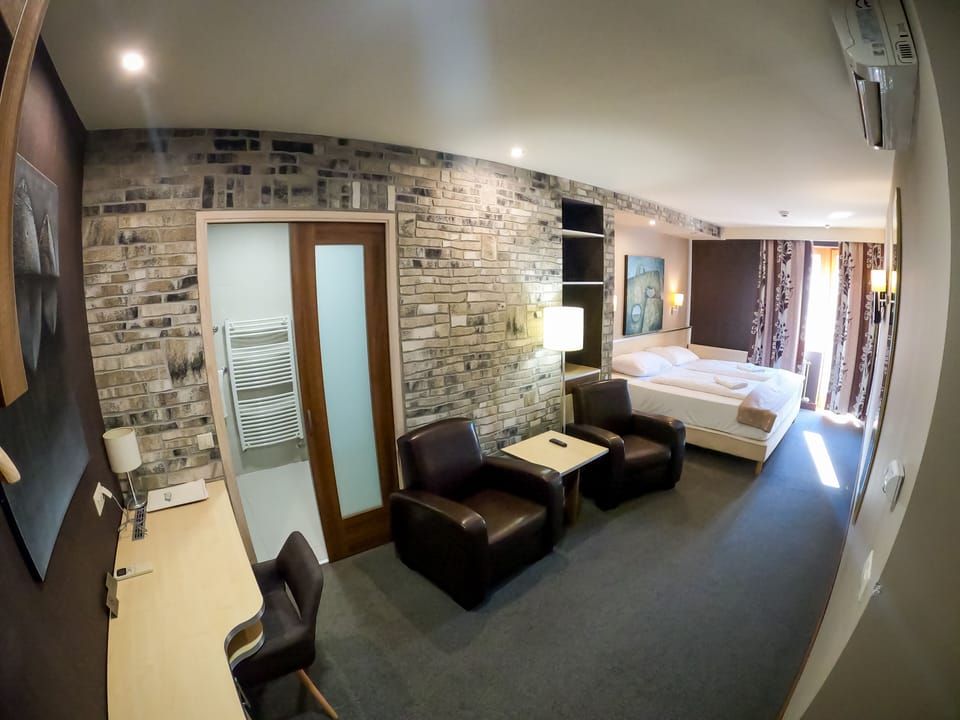 Deluxe Double Room | Pillowtop beds, in-room safe, desk, blackout drapes