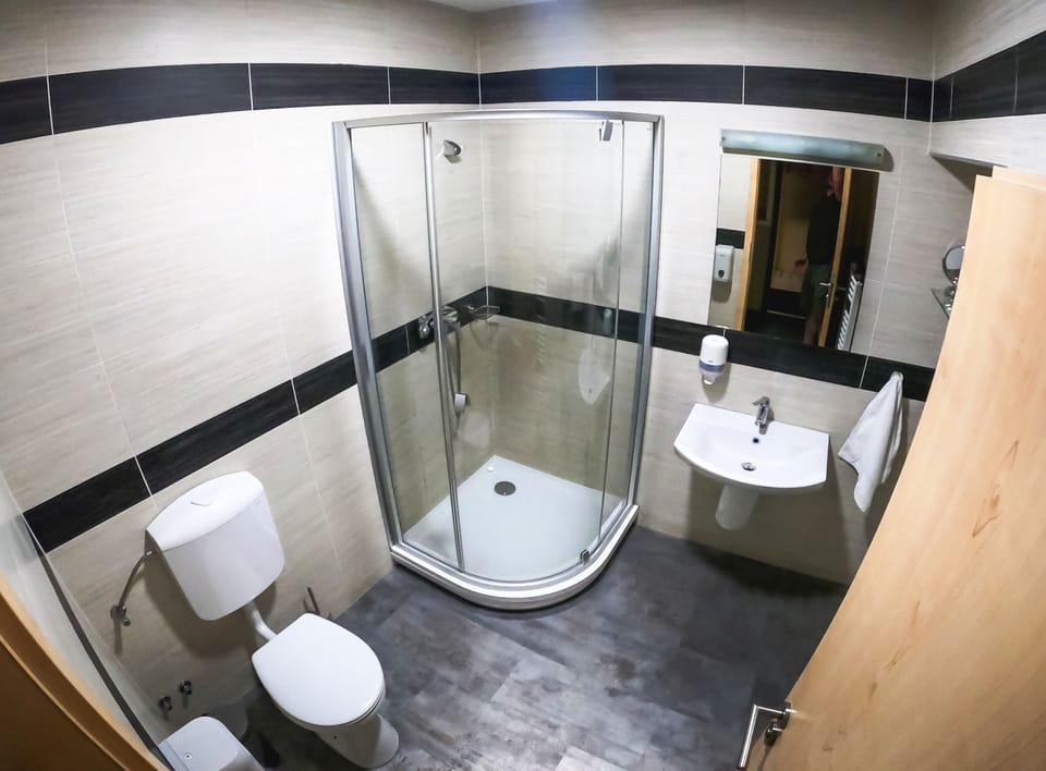 Shower, hydromassage showerhead, hair dryer, towels