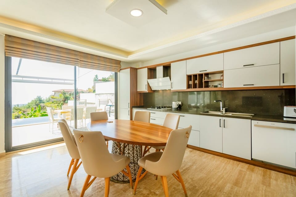 Deluxe Villa | Private kitchen | Full-size fridge, microwave, stovetop, dishwasher