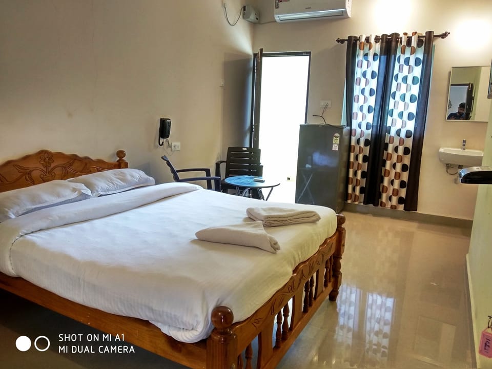 Deluxe Quadruple Room, Multiple Beds, Smoking | Room amenity
