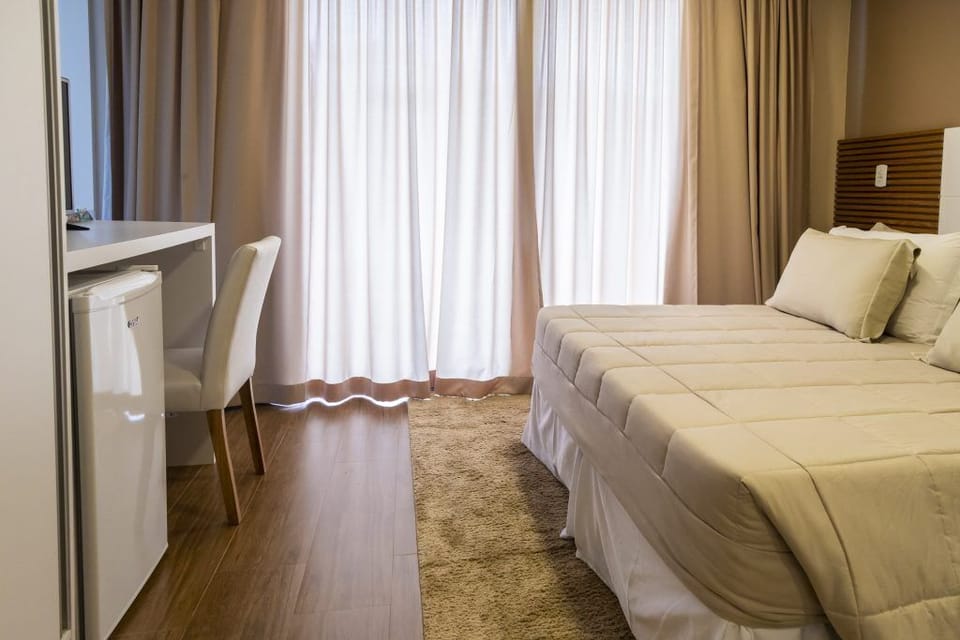 Suíte Vip Junior | Minibar, in-room safe, blackout drapes, WiFi (free)