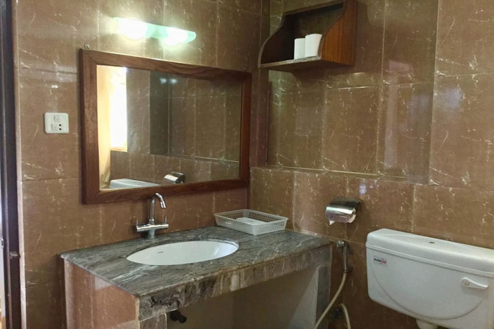 Standard Room | Bathroom | Shower, slippers, towels