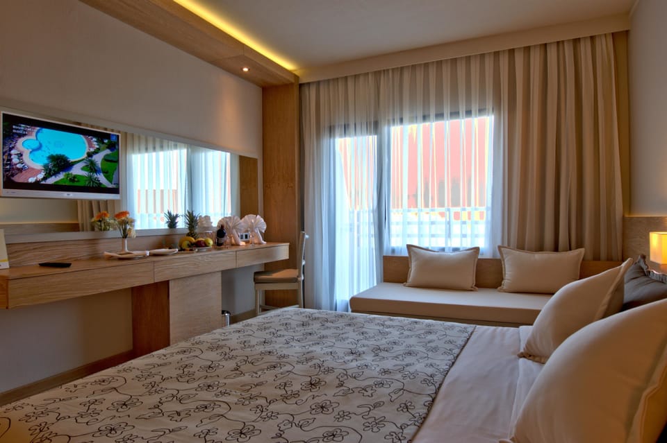 Minibar (some free items), in-room safe, desk, cribs (free)