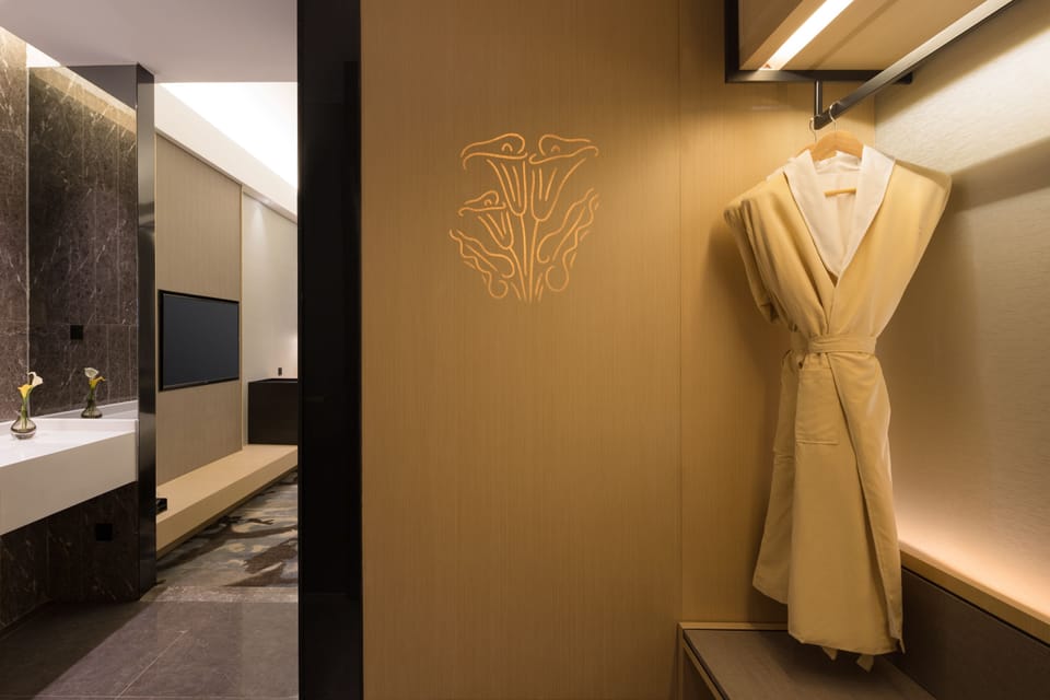 Premium bedding, down comforters, pillowtop beds, minibar