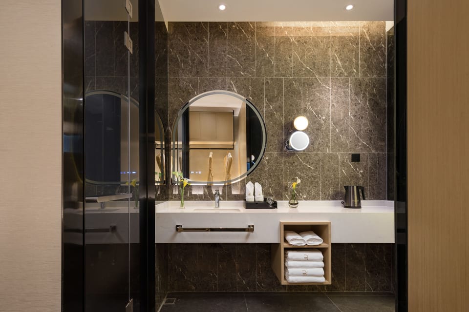 Shower, hydromassage showerhead, hair dryer, bathrobes