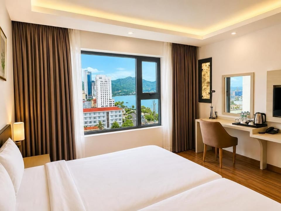 Deluxe Twin Room, 1 Bedroom, City View | Premium bedding, memory foam beds, minibar, in-room safe