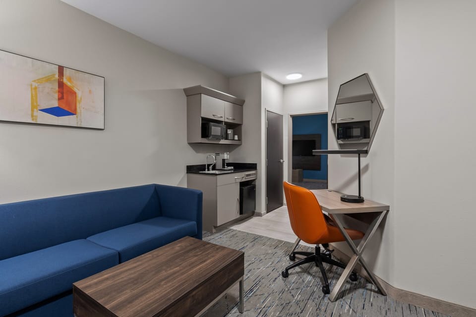 Suite, 1 King Bed with Sofa bed (Wet Bar) | Desk, laptop workspace, blackout drapes, iron/ironing board