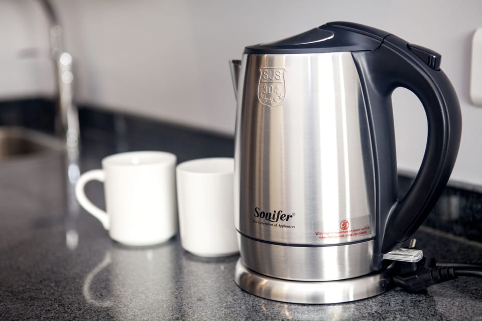 Coffee/tea maker, fridge, microwave, electric kettle